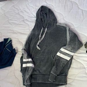 A grey hoodie/jacket